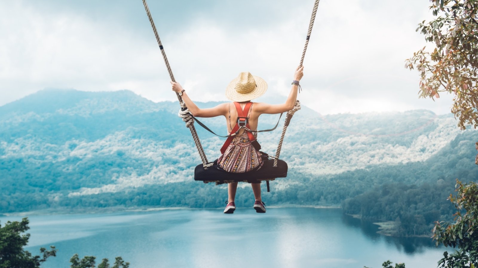 beautiful-girl-enjoying-freedom-on-swing-in-bali-indonesia.jpg